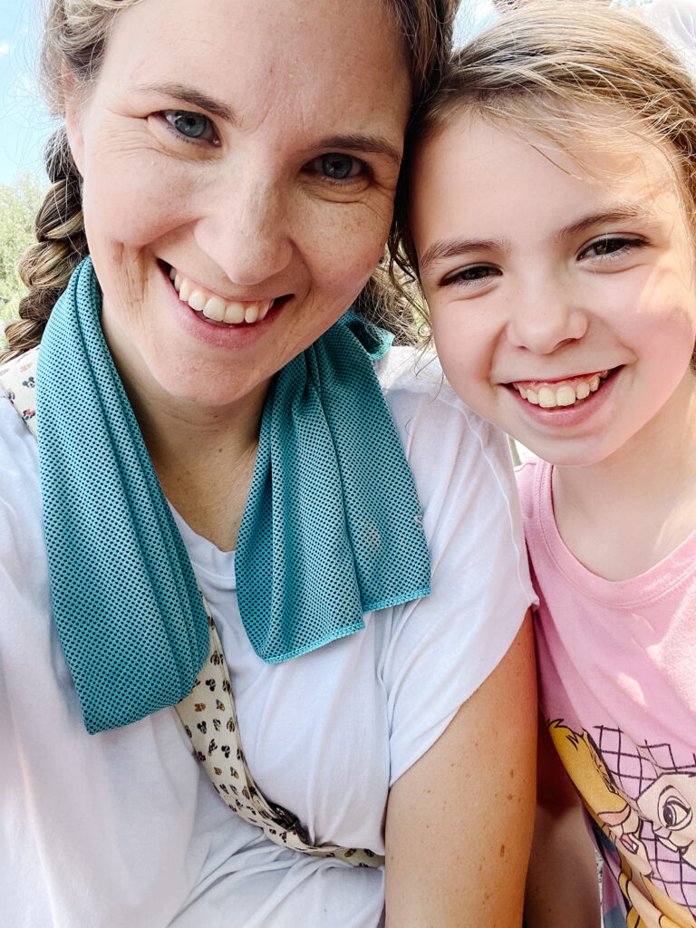 Cooling Towels on mom for summer in Disney World