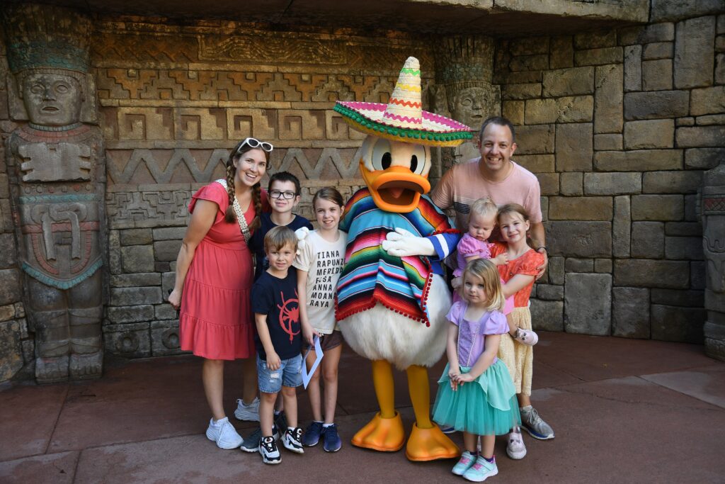 Large Family with Donald in Disney World during Summer