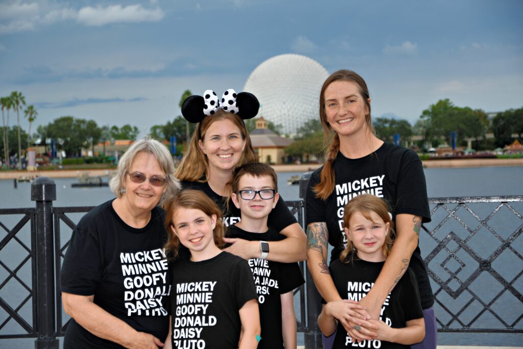 Family photo at EPCOT by Disney Photopass Photographer