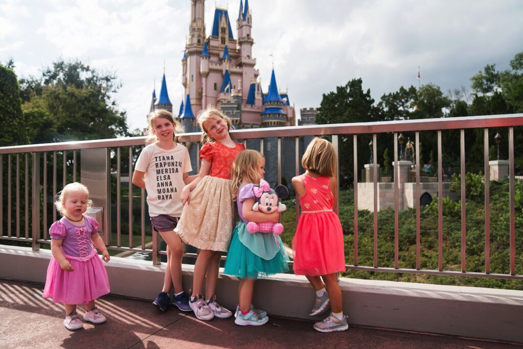 Five girls near Cinderella's Castle in Magic Kingdom