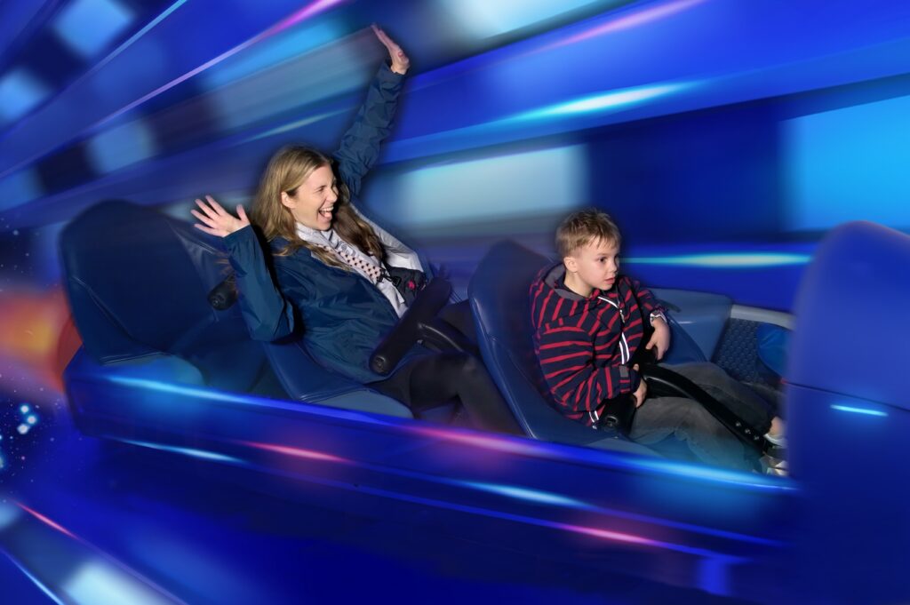Mother and son on Space Mountain in Walt Disney World