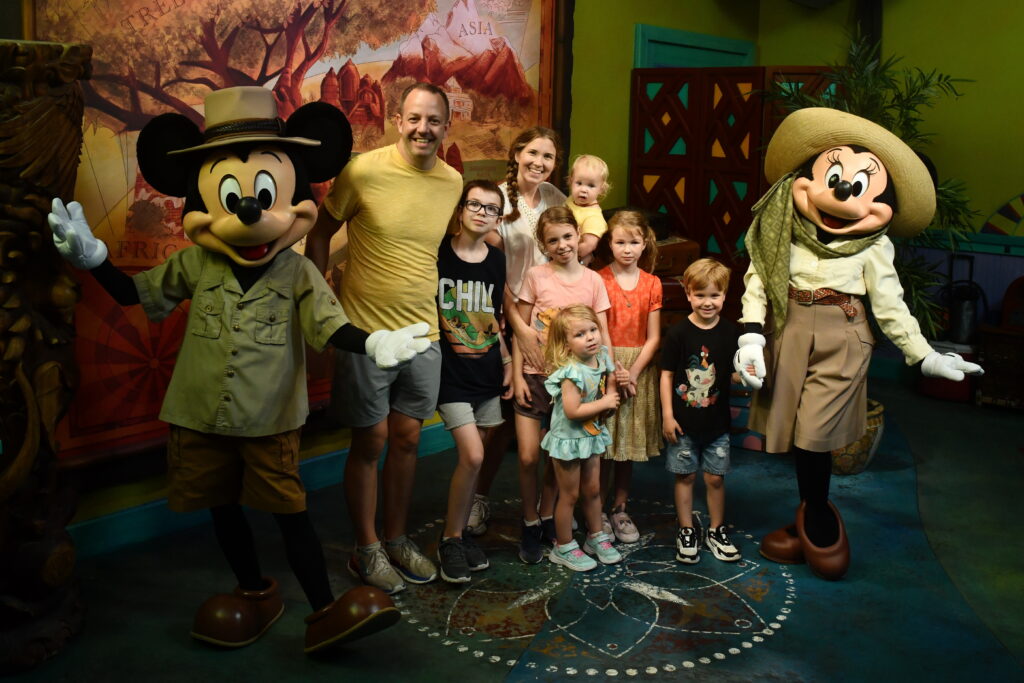 Big family in Animal Kingdom with Minnie and Mickey