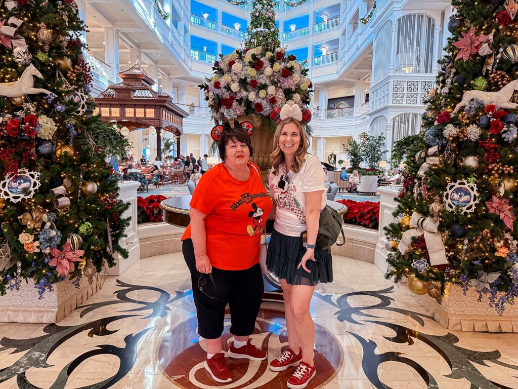 Christmas at the Grand Floridian in Disney World, Two woman standing by Christmas Trees